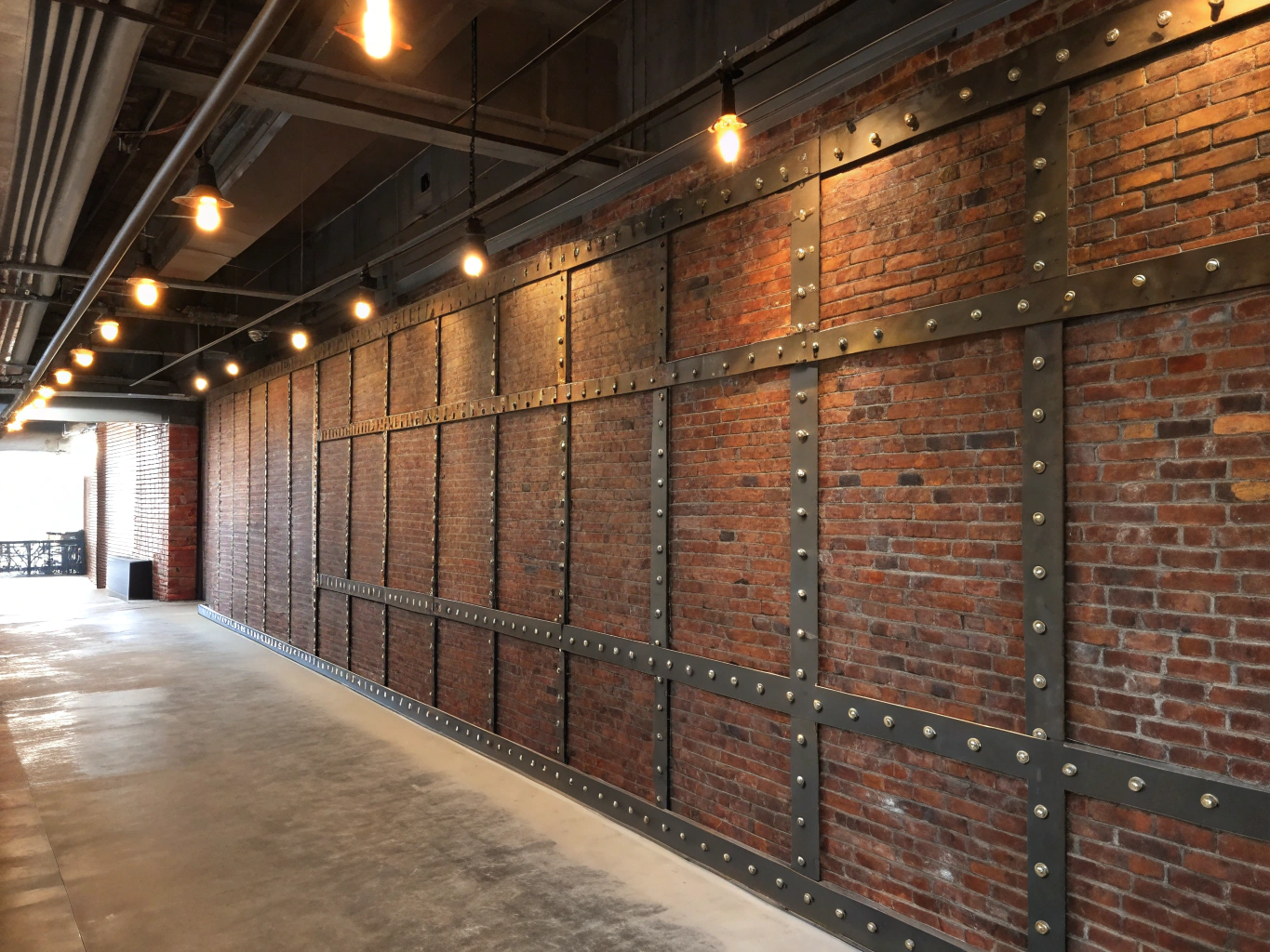 Simulated brick veneer installation on a feature wall